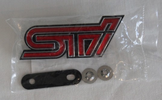 Genuine OEM Subaru STi Grille Badge 