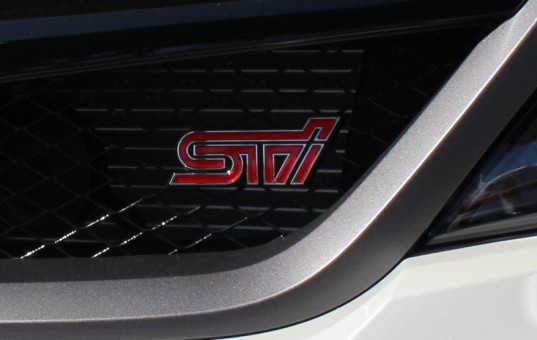 Genuine OEM Subaru STi Grille Badge 